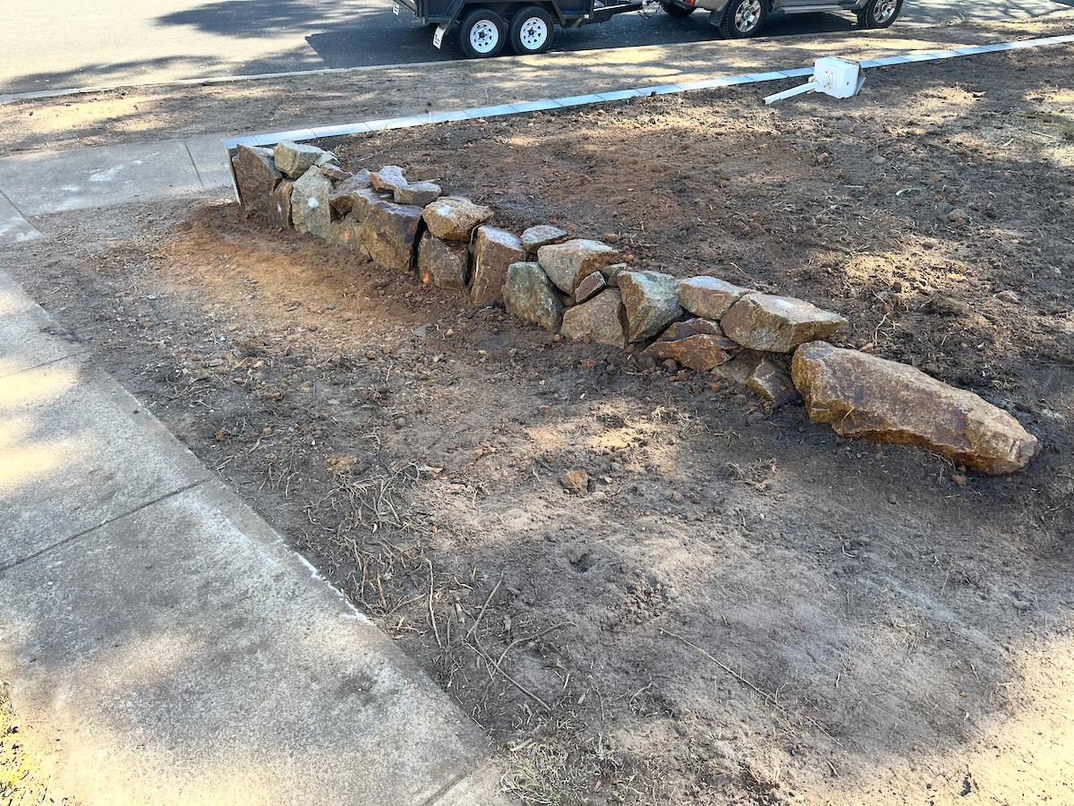 A cleanly excavated path ready for paving.